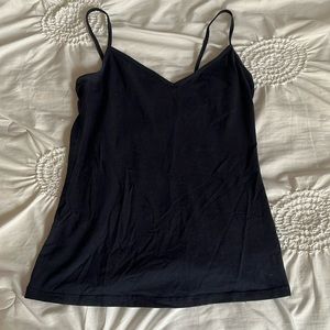 3 tank tops in navy, pale pink, and white tank tops